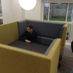 Small meeting/working area with high backed seating to give some privacy