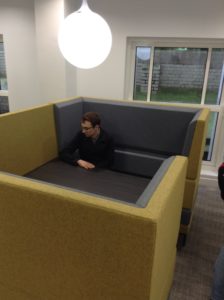 Small meeting/working area with high backed seating to give some privacy