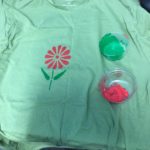 Flower stencilled on t-shirt