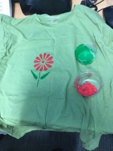 Flower stencilled on t-shirt